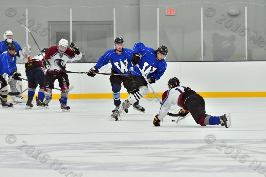 Wheaton College Men\'s Ice Hockey vs Middlesex Community College. - Photo By: KEITH NORDSTROM